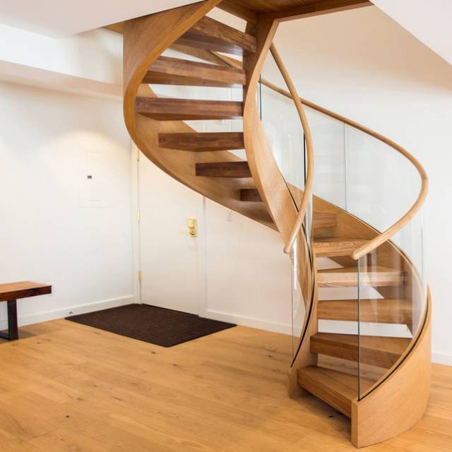 Spiral Wood Staircase Discover the allure of MAAS Wood Work's spiral wood staircases in Saudi Arabia. Crafted with precision, our spiral staircases offer a space-saving solution while enhancing the aesthetic appeal of your home or office.